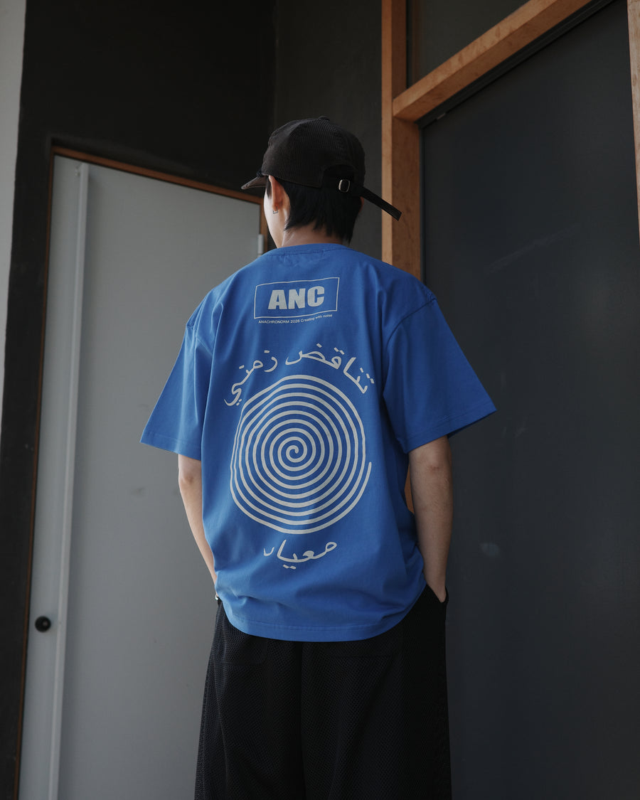 ANACHRONORM ヴォルテックス プリント 半袖Tシャツ ブルー | 90年代 音楽カルチャー グラフィック 渦 コットン100%