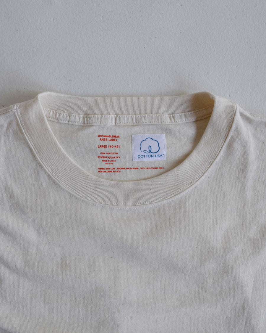 ANACHRONORM ANSE サイドベンツ ショートスリーブTシャツ ナチュラル | 18/1 COTTON USA認証 米綿 ANACHRONORMオリジナルファブリック リジット サステナブル