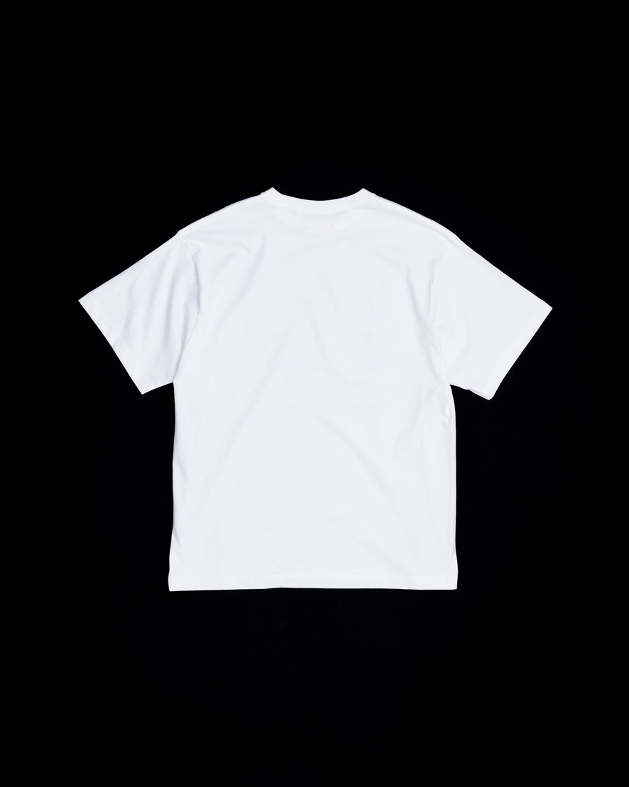 ANACHRONORM × Souvenyr NYC ジャンピング 半袖Tシャツ ホワイト | コラボグラフィック ニューヨーク コットン100%
